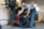 mechanic-changing-car-tire-using-professional-equi-2026-03-19-07-49-21-utc.jpg