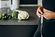 young-woman-with-measuting-tape-weist-kitchen.jpg
