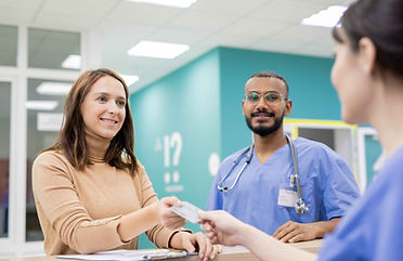 patient-giving-credit-card-to-receptionist-in-clin-2026-01-09-08-10-54-utc_11zon.jpg