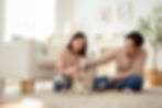 young-couple-enjoys-playful-moment-with-pet-dog-in-2026-01-09-01-10-29-utc.jpg
