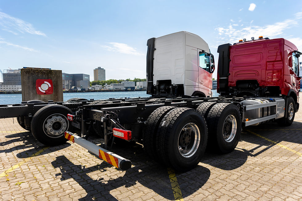 back-view-many-new-heavy-commercial-cargo-transpor-2026-01-07-00-23-03-utc.jpg