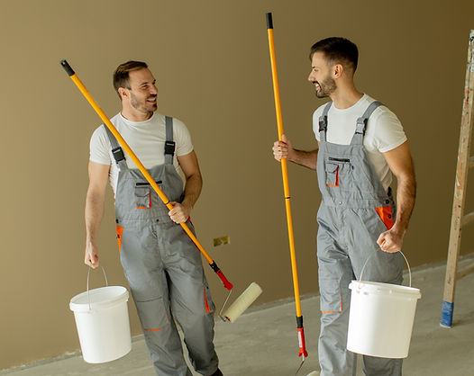 two-men-prepare-for-painting-a-room-in-a-residenti-2026-03-05-11-39-16-utc.jpg