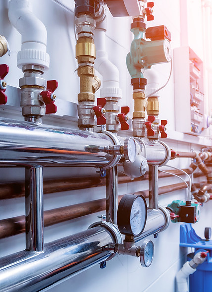 commercial building plumbing being inspected