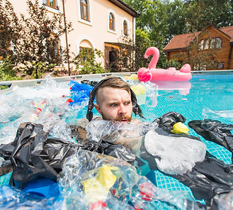 man-in-pool-surrounded-by-plastic-waste-2026-03-19-08-59-40-utc.jpg