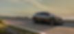 Kia EV6 GT driving along the seashore_edited_edited.jpg