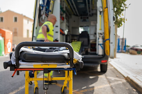 paramedic-preparing-stretcher-near-ambulance-for-e-2026-03-25-10-03-33-utc.jpg