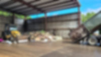 dump-truck-has-dumped-trash-in-shed-and-bulldozer-2026-01-09-00-03-28-utc.jpg