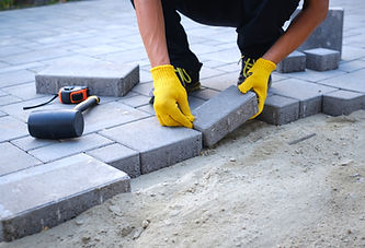 worker-installing-concrete-pavers-for-a-patio-proj-2026-03-19-21-52-15-utc.jpg