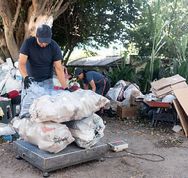an-adult-hispanic-man-is-weighing-recycled-wealth-2026-01-07-05-54-50-utc_11zon.jpg