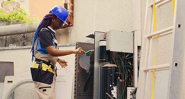 female-worker-cleaning-air-conditioner-with-brush-2026-03-19-01-49-14-utc_11zon.jpg