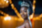 elegant-black-winner-of-beauty-pageant-contest-blurred-stage-background-photo-transformed.
