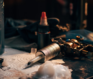 close-up-view-of-tattoo-machine-ink-and-other-equ-2026-03-13-01-07-24-utc (1).jpg