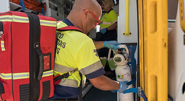 medical-professional-prepares-oxygen-tank-in-ambul-2026-03-26-08-03-06-utc.jpg