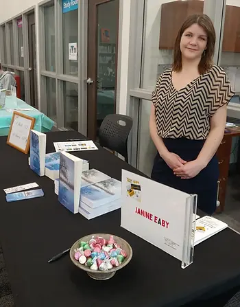 Janine Eaby at her book signing event for Beyond the Water's Edge.