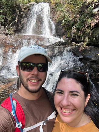 A couple in front of Laurel Falls in Great Smoky Mountains National Park