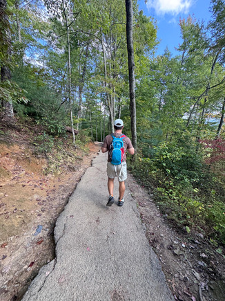 A man hiking a trail in Great Smoky Mountains National Park
