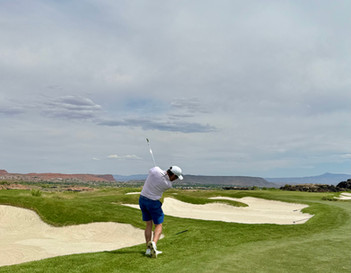 A man playing gold at Black Desert Resort