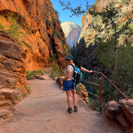 A woman posing along Angels Landing Trail