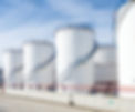 large white Industrial tanks for petrol and oil.jpg