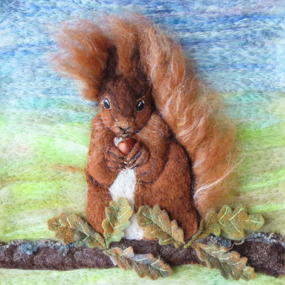 Fibre art portrait of a red squirrel, sitting up and eating a hazelnut