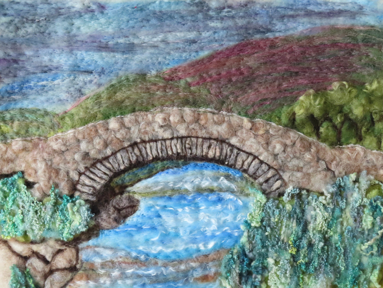 Fibre art picture of a Cumbrian Packhorse Bridge