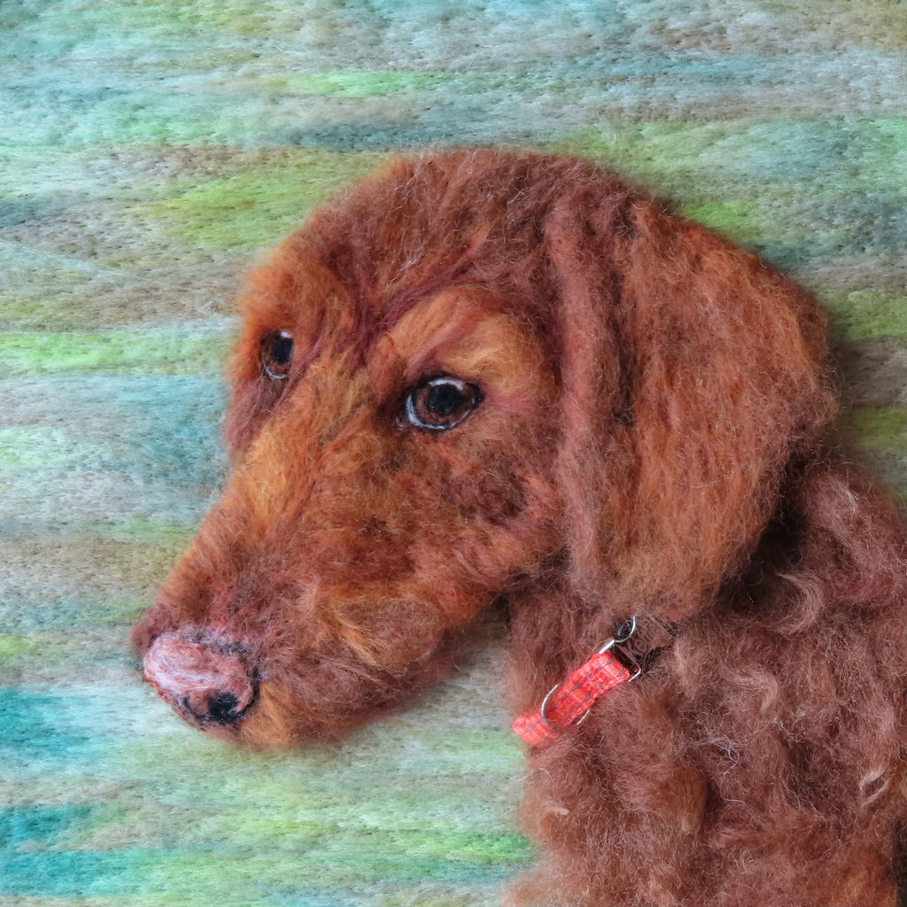 Fibre art portrait of a labradoodle
