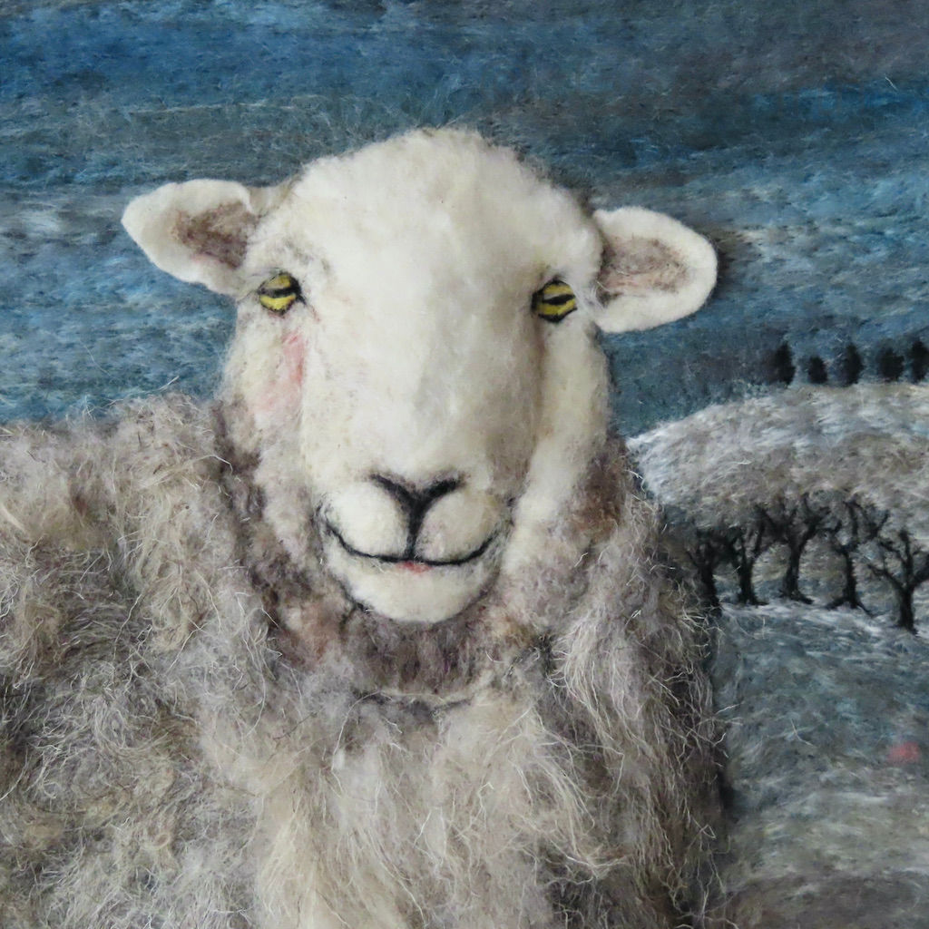 Fibre art portrait of a Herdwick ewe needle felted with Herdwick wool
