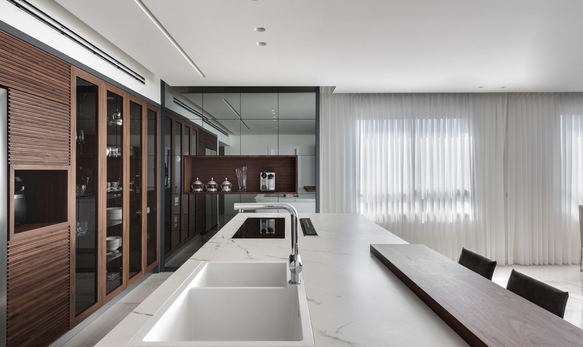 Los Angeles modern custom kitchen with matte black cabinets and glass by iKitchen Cabinetry