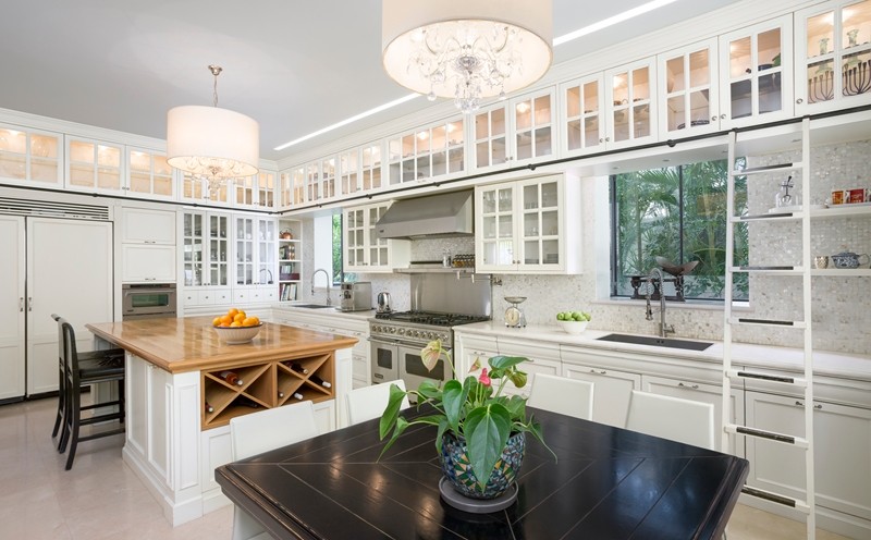Westmount custom kitchen with full overlay white shaker doors and butcher block by iKitchen Cabinetry