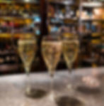 Three glasses of Cava in a wine bar by Niels Baars