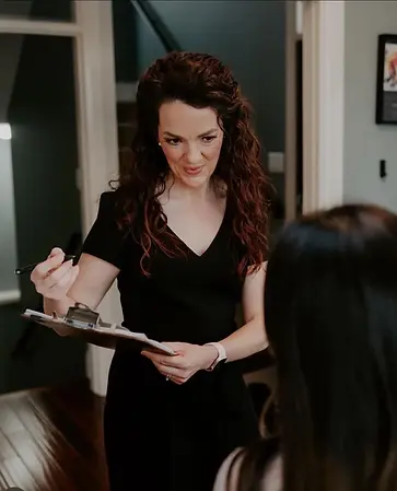 Nurse practitioner Shandalin O'Mahony, who offers injectable services such as filler and botox in Oliver, BC at Okgn Laser Lounge, consulting with a patient.