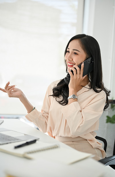 professional-millennial-asian-businesswoman-is-phone-with-her-business-client.jpg