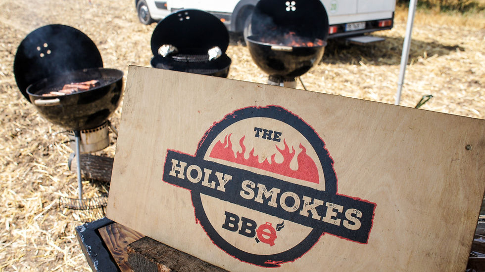 Close-up view of perfectly grilled ribs on a wooden platter