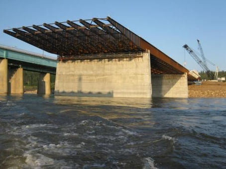 Simultaneous launch of ten girders across the Athabasca River in Fort McMurray, 2009.