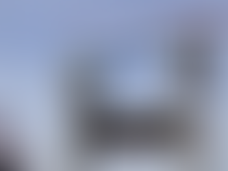 ULMA MK heavy-duty truss falsework supporting the staged casting of the lower tower crossbeam between the legs of the stal̕əw̓asəm (Riverview) Bridge tower during construction.