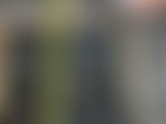 A person measures a rebar grid in soil using a yellow tape measure and reviews building plans on a tablet. The picture was talen by HB Design and Engineering in St. Petersburg and its used to represent structural engineering services.