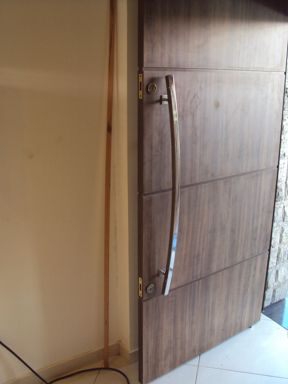 Puxador em aço inox curvado