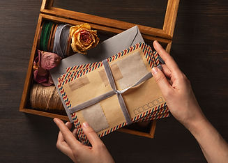 top-view-hand-holding-love-letter.jpg