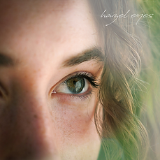 "Hazel Eyes" by Sabrina Jordan cover art (closeup portrait of a girl's hazel eye and curly hair)