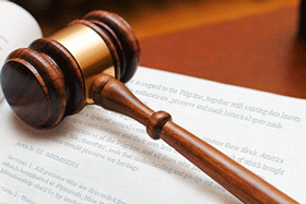 Photo of gavel and bylaws pages