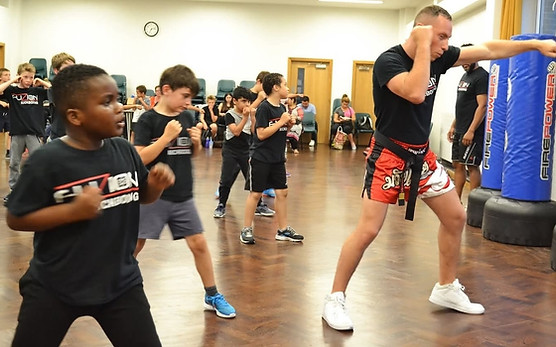 Fuzion Kickboxing Instructor Teaching Children