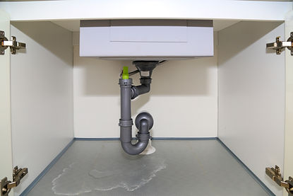 Water leaks from the drain hose under the sink