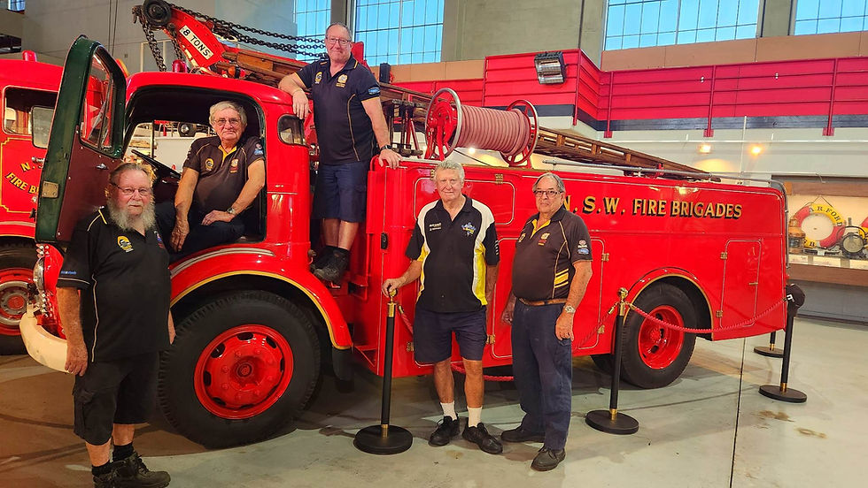 Museum of Fire Volunteers posing in front of the Commer which received a Heritage Trust Award Nomination, 2023