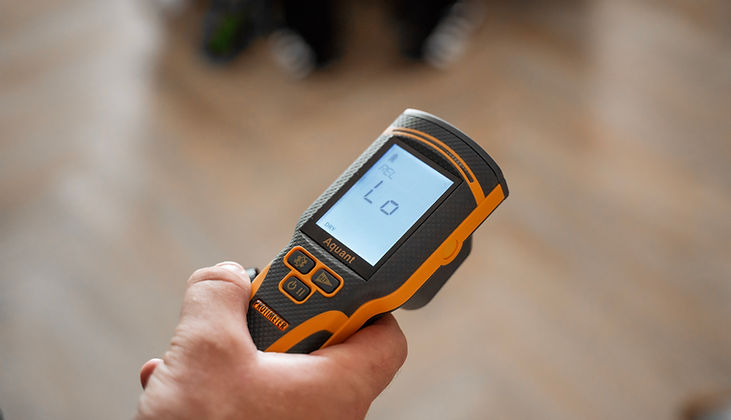 Moisture metre evidencing water damage in a home
