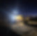 Excavation working at night with lights on construction site