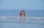 Couple standing in sea