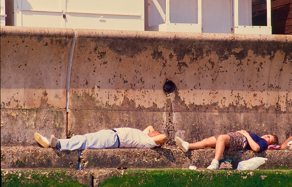 untidy sunbathing on concrete