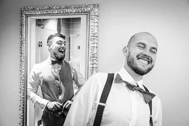 humorous moment as groom dresses for wedding