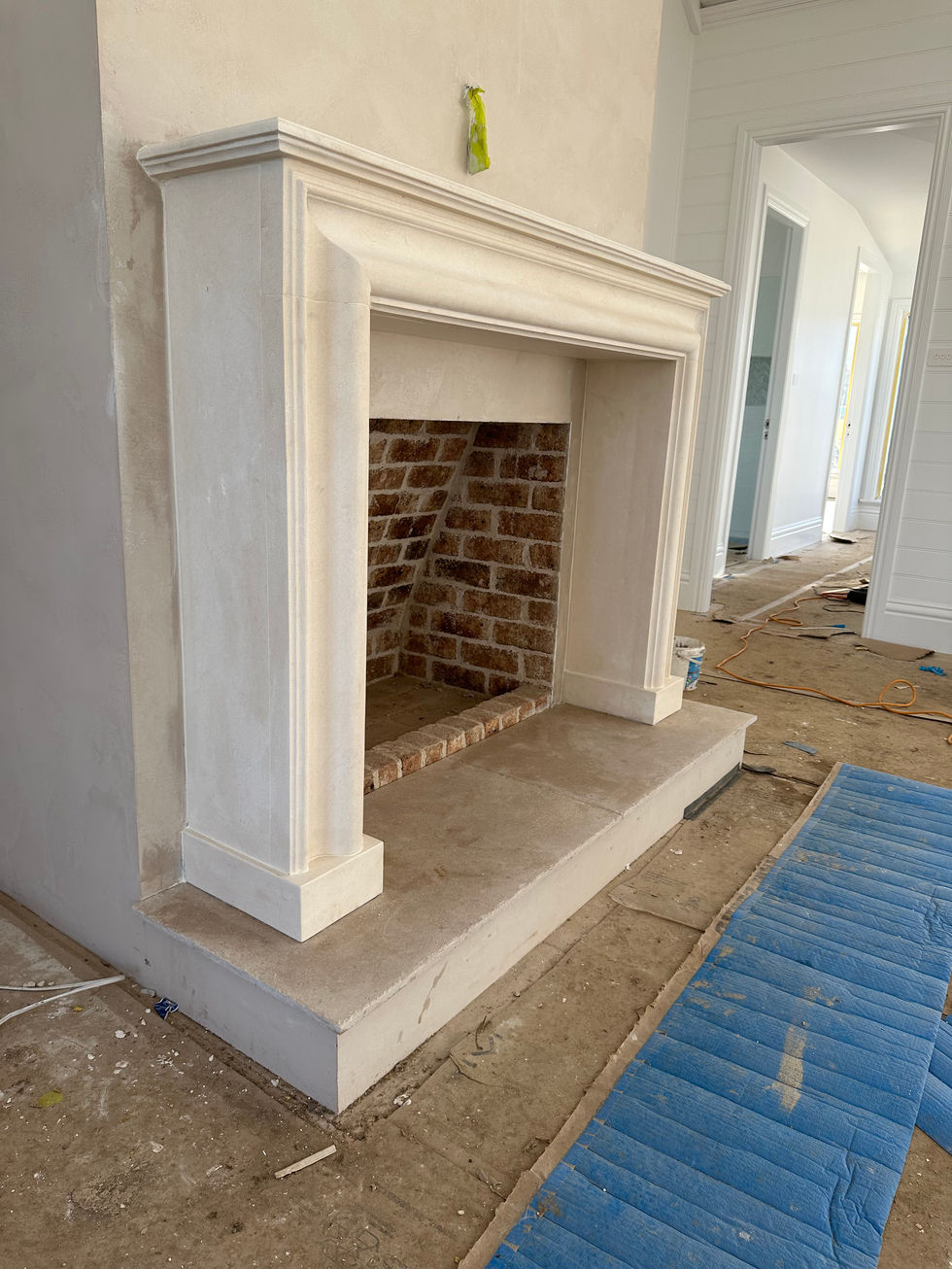 Limestone in raised hearth