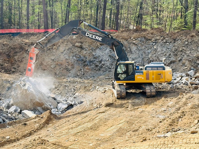High angle view of mechanical rock breaking equipment at a construction site